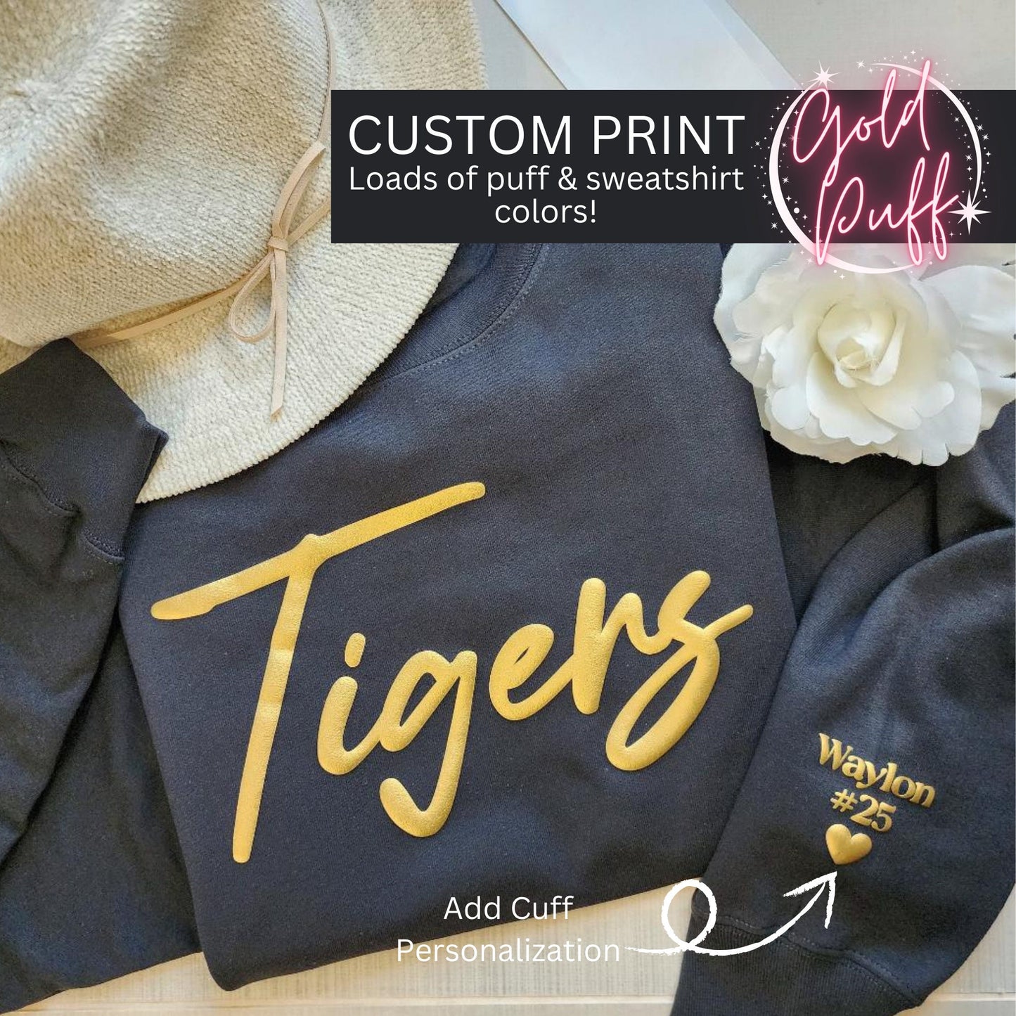 a close up of a shirt with the word tigers on it